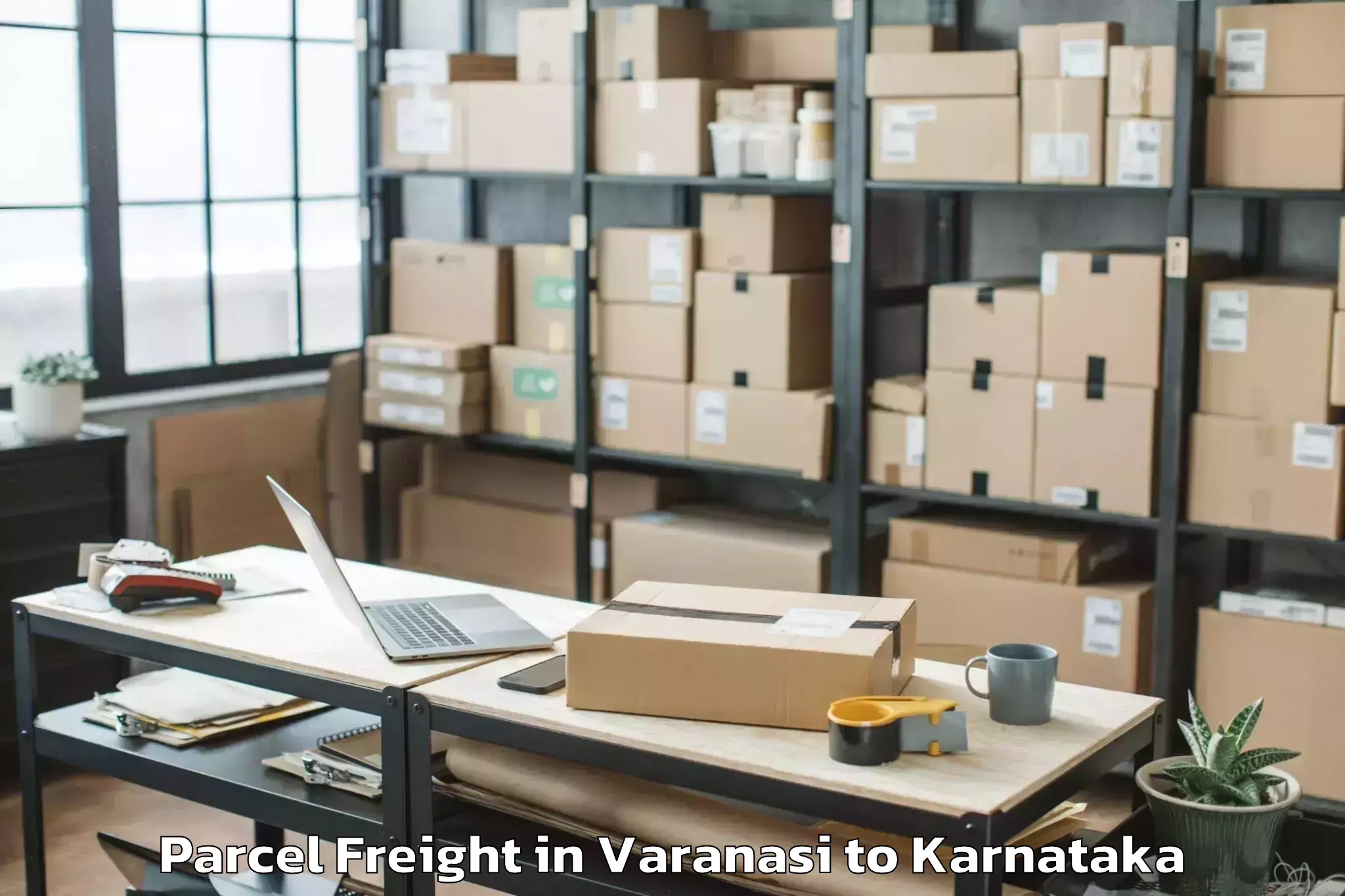 Book Varanasi to Melukote Parcel Freight